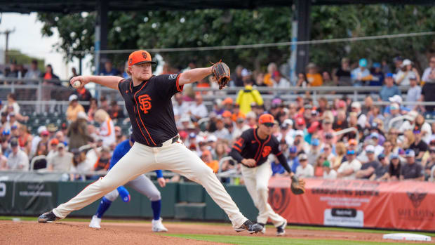 San Francisco Giants pitcher Logan Webb (62) on the mound in the first inning against the Chicago Cubs during a spring training game at Scottsdale Stadium.